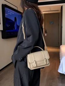 Stylish leather messenger bag for women, casual crossbody shoulder bag with top handle.