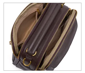 Genuine leather Boston shoulder bag for women, multi-compartment retro handbag with zippers.