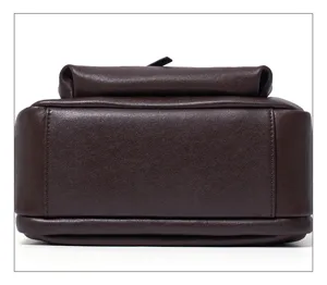 Detailed view of the dark brown genuine leather retro women handbag bottom stitching texture.