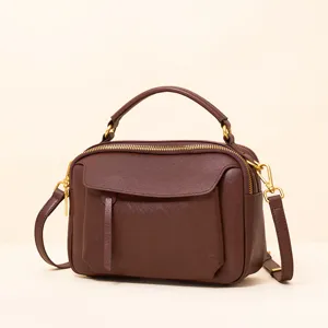 Genuine leather Boston handbag for women, vintage crossbody and top handle shoulder bag.
