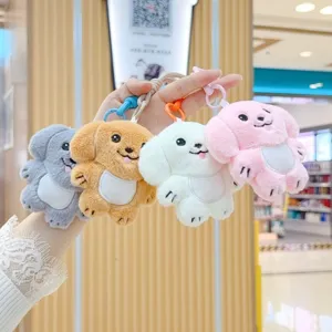 Close-up detail of colorful plush puppy keychains, cute stuffed animal hanging charms.