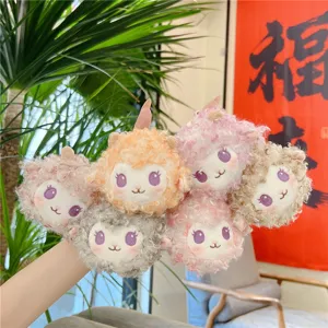 Cute little sheep plush keychain doll, fluffy animal bag pendant and soft toy accessory.