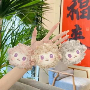 Close-up view of fluffy plush lamb keychains, cute stuffed animal pendant details and cute face.