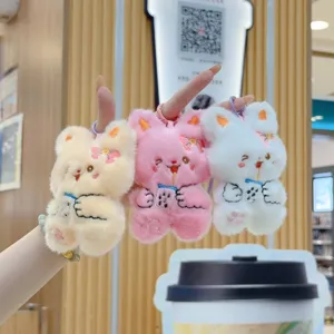 Cute plush rabbit keychain pendant with milk tea design, soft stuffed animal toy for bags.