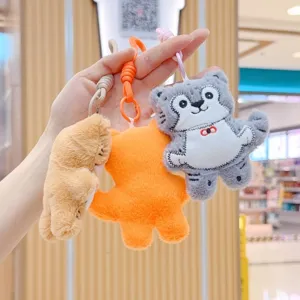 Plush cartoon animal keychain detail shot, showing cute embroidered expression and soft fabric.