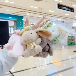 Cute plush rabbit keychain with plaid bow and scarf. Soft fluffy bag ornament pendant toy.