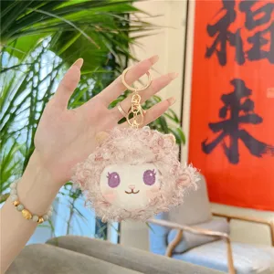 Cute little sheep plush keychain, fluffy lamb doll bag charm and kawaii backpack accessory.