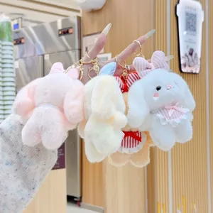 Cute plush rabbit keychain with bow and plaid dress, perfect bag charm and toy doll for daily use.