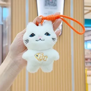 Cute white cat plush toy keychain with orange strap, soft stuffed animal bag pendant.