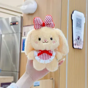 Cute plush rabbit pendant with plaid bowknot and bib, soft stuffed doll bag charm decoration.