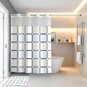 Detail view of the geometric square pattern shower curtain showing clean texture and metal rings.