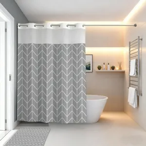 Grey chevron pattern shower curtain detail shot, modern minimalist fabric bathroom decor.