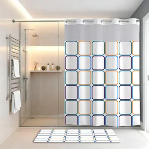 Geometric grid pattern shower curtain detail view in modern bathroom setting with matching mat.