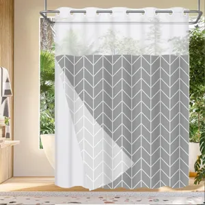 Modern grey and white chevron pattern shower curtain with sheer top window for bathroom decor.