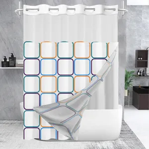 Detail view of double-layer hookless shower curtain featuring geometric grid print.