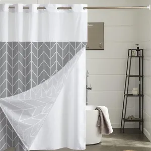 Detailed view of the double-layer shower curtain with geometric chevron pattern and metal grommets.