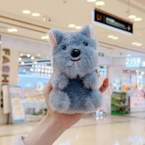 Cute grey plush puppy toy with tongue out, soft stuffed animal doll for desk decor and gift.