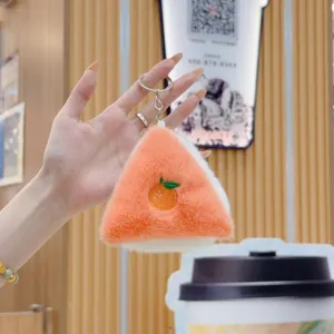 Cute plush orange sandwich keychain detail shot, soft material with metal ring and clasp.