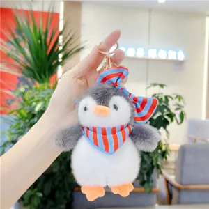Joli porte-clés pingouin en peluche douce avec nœud rayé, adorable pendentif pour sac à main.