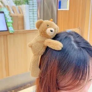 Cute brown teddy bear plush hair clip detail, soft toy hairpin for daily wear.