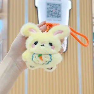 Cute yellow plush rabbit keychain bag pendant with carrot embroidery for backpack and keys.