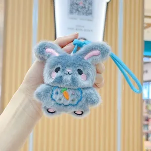 Cute blue plush bunny keychain with embroidered details and carrot motif, soft toy pendant.