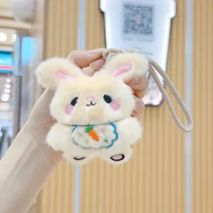 Cute fluffy rabbit plush keychain charm with embroidered carrot detail, soft toy pendant.