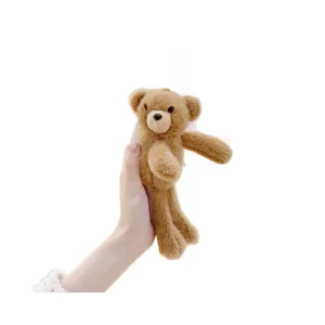 Cute brown teddy bear plush hair clip mini doll accessory for women girls daily styling.