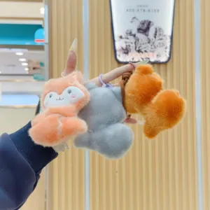 Cute embroidered animal plush doll keychain pendant detail showing plush pendant design features.