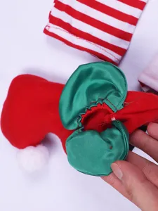 Christmas elf costume accessory set with red green hat and striped sleeves for holiday party.