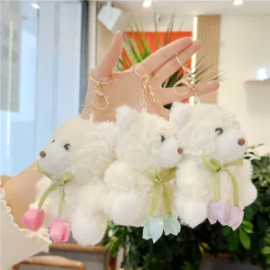 Cute plush bear keychain with ribbon flower pendant, soft fluffy toy bag charm pendant.