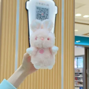 Cute pink plush bunny rabbit doll keychain soft stuffed toy for cute girls and birthday gifts.