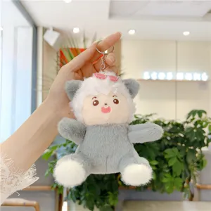 Cute grey and white sheep plush doll keychain pendant, soft toy accessory detail view.