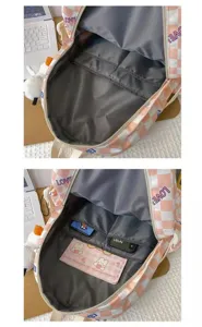 Vista interna dettagliata dello zaino a quadri rosa e bianco con pratiche tasche.