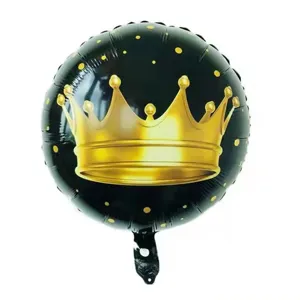 Close-up of 18-inch black foil balloon with golden crown and polka dot pattern