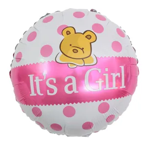 Round pink polka dot foil balloon featuring a cartoon bear and It's a Girl text detail