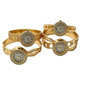 Goldene hohle Manschettenknopfuhr Set mit Strasslünette