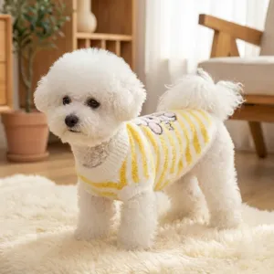 Close-up of cozy knitted striped pet sweater with cute cartoon back design for small dogs.