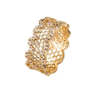 Elegant Korean style wave honeycomb openwork gold ring with micro-set cubic zirconia.