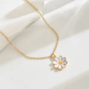 Exquisite gold chain necklace featuring a charming white enamel daisy flower pendant for women.