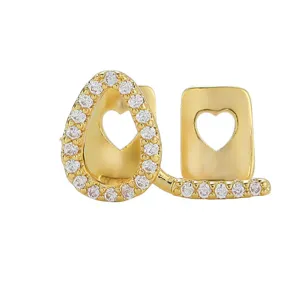 Διπλά grillz δοντιών με λαμπερά ζιρκόν και κοπή καρδιάς για μοντέρνο στιλ πάρτι χιπ-χοπ.