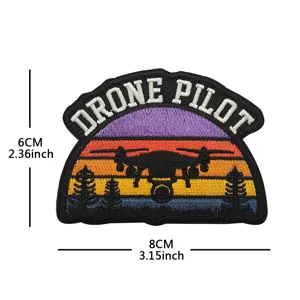 Detailed close-up of the drone pilot embroidered patch featuring sunset forest and clear stitching.