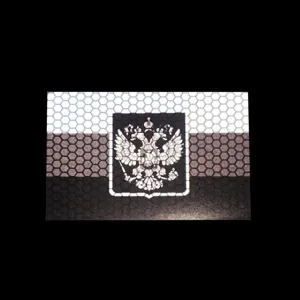 Vue détaillée du patch tactique aigle bicéphale russe avec motif en nid d'abeille réfléchissant.