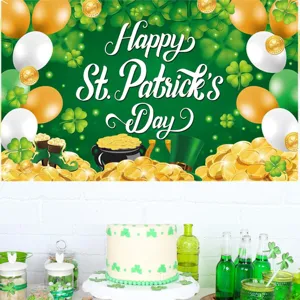 St. Patrick's day backdrop banner detail showing shamrock gold coin patterns and party setup.