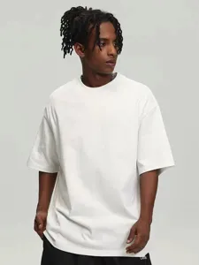 Detailed view of the men's heavy oversized solid color short sleeve t-shirt in white.