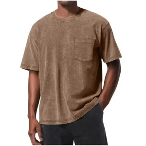 Detailed view of vintage washed brown men short sleeve t-shirt with chest pocket design.