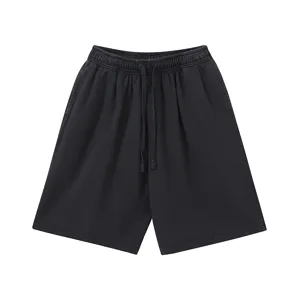 Detailed view of vintage washed loose cotton shorts with adjustable drawstring elastic waist.