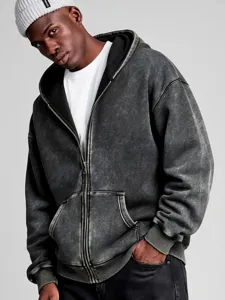 Detailed close-up view of vintage washed zip-up hoodie featuring cozy fleece lining.
