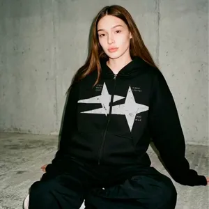 Sweat à capuche zippé streetwear vintage avec imprimé étoile, haut unisexe décontracté.