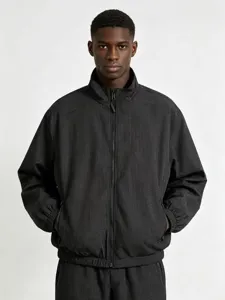 Detailed view of the dark plaid stand collar zip jacket, showcasing fabric texture.